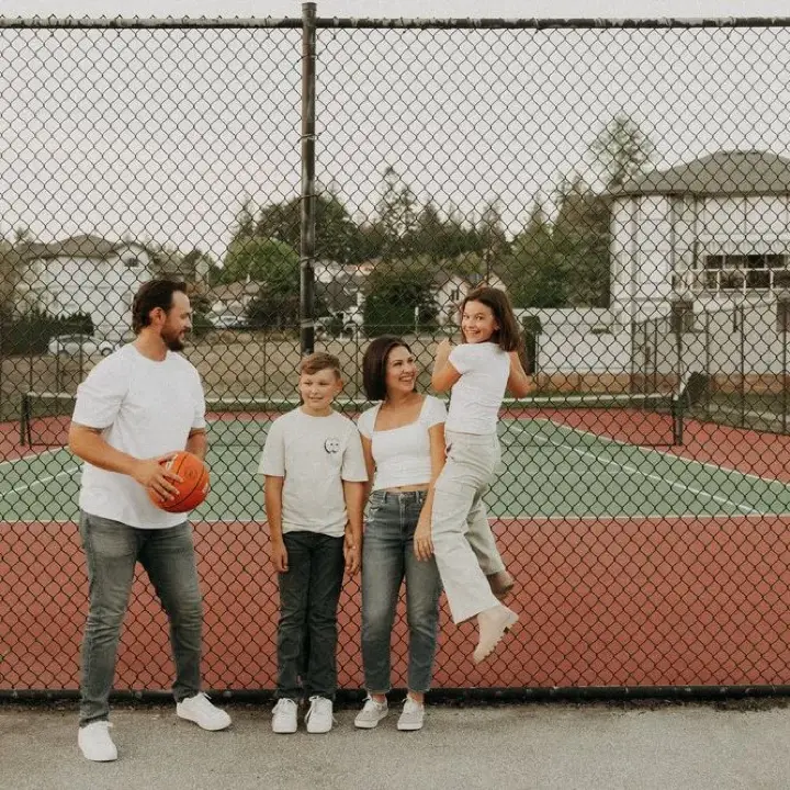 Family photographed together outdoors