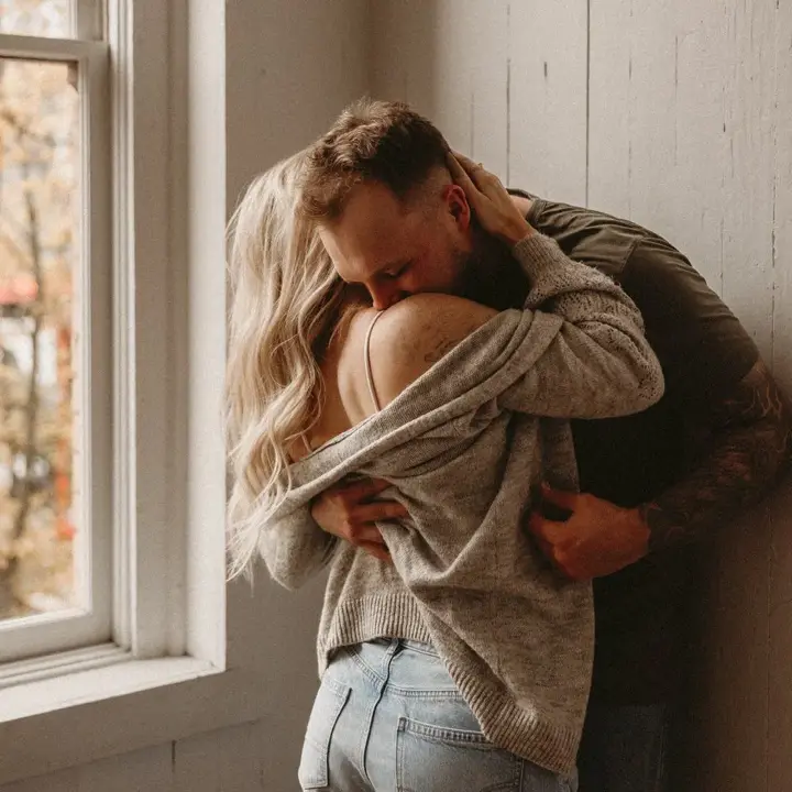 Couple relaxing indoors