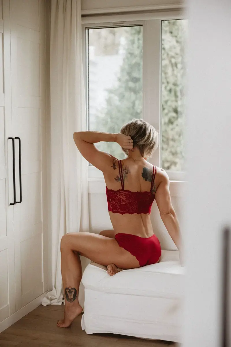 Boudoir portrait in red lingerie